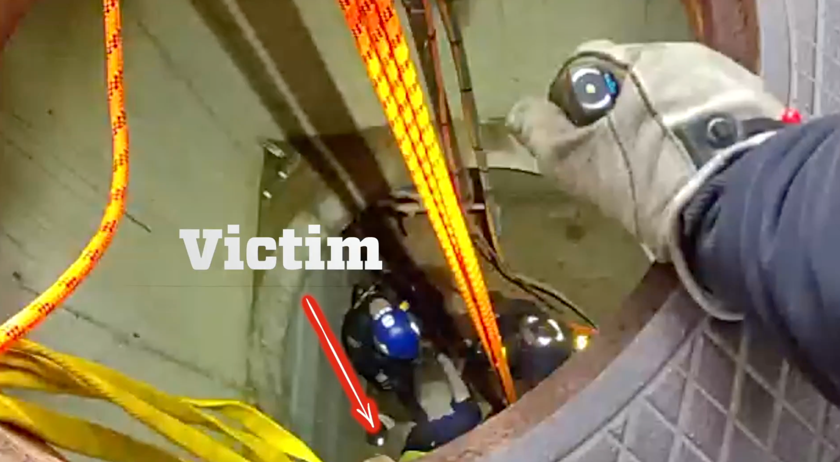 The first responders strapped the construction worker to a backboard before pulling him up to safety