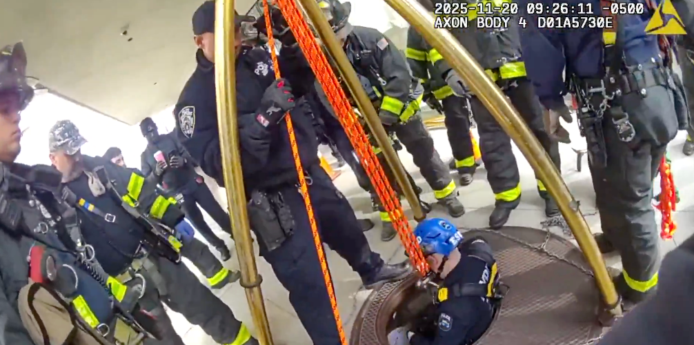 Dramatic footage showed the first responders sending an officer down to check on the man after he fell below the ground