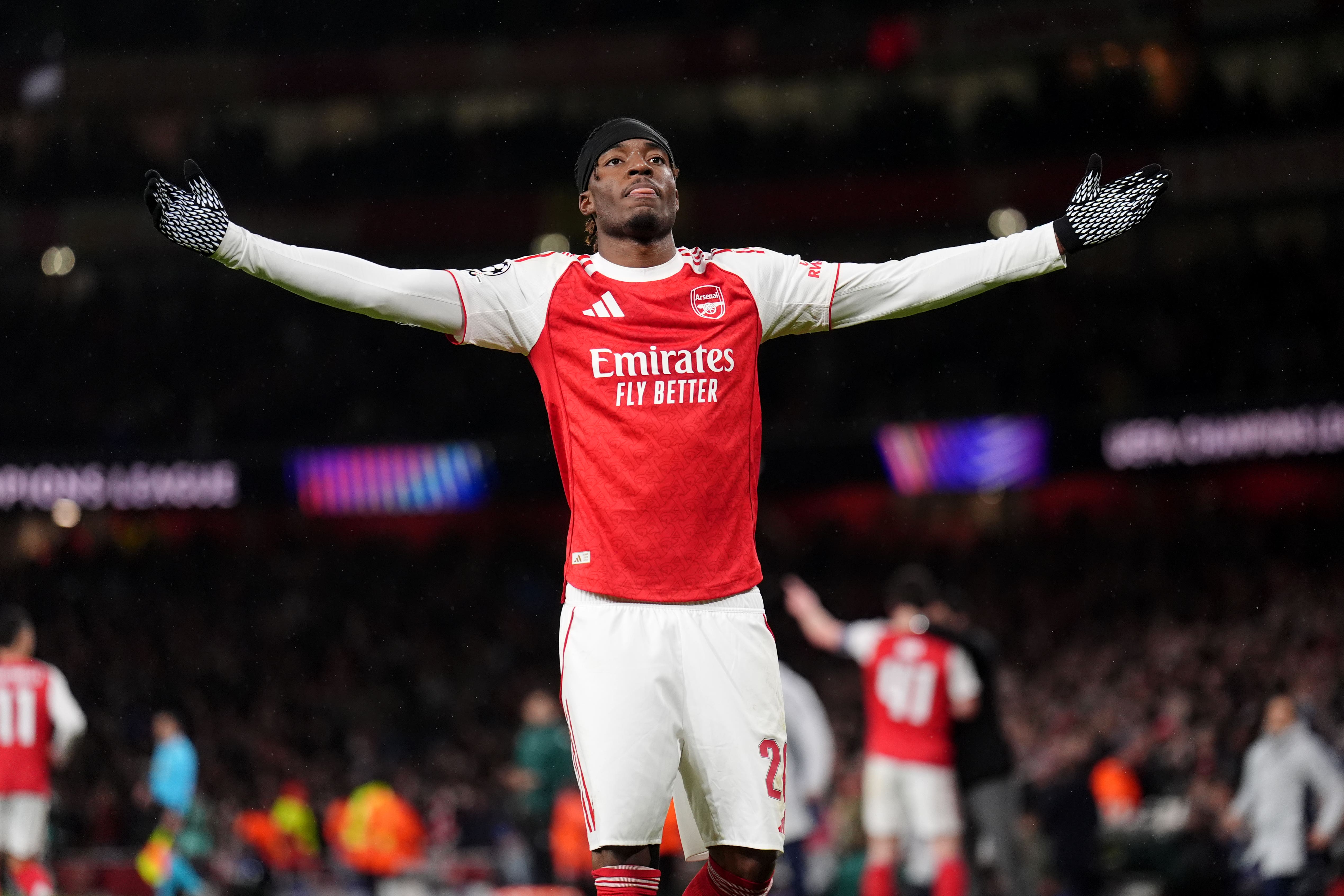 Noni Madueke celebrates scoring for Arsenal against Bayern Munich (John Walton/PA)