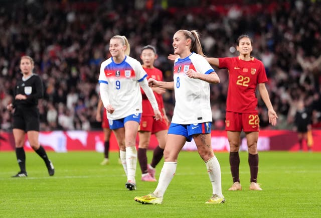 <p>Georgia Stanway celebrates scoring her third of the night</p>