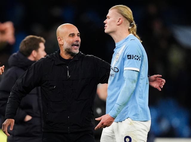 <p>Pep Guardiola praised Erling Haaland after he reached 100 Premier League goals (Martin Rickett/PA)</p>