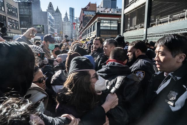 <p>Immigration activists block a garage used by ICE vans during a protest against a purported ICE raid on Canal Street on November 29, 2025 in New York City. Activists assembled outside of a garage used by ICE and later they tried to block ICE vehicles as they traveled from the garage down Canal Street to the Holland Tunnel to exit Manhattan</p>
