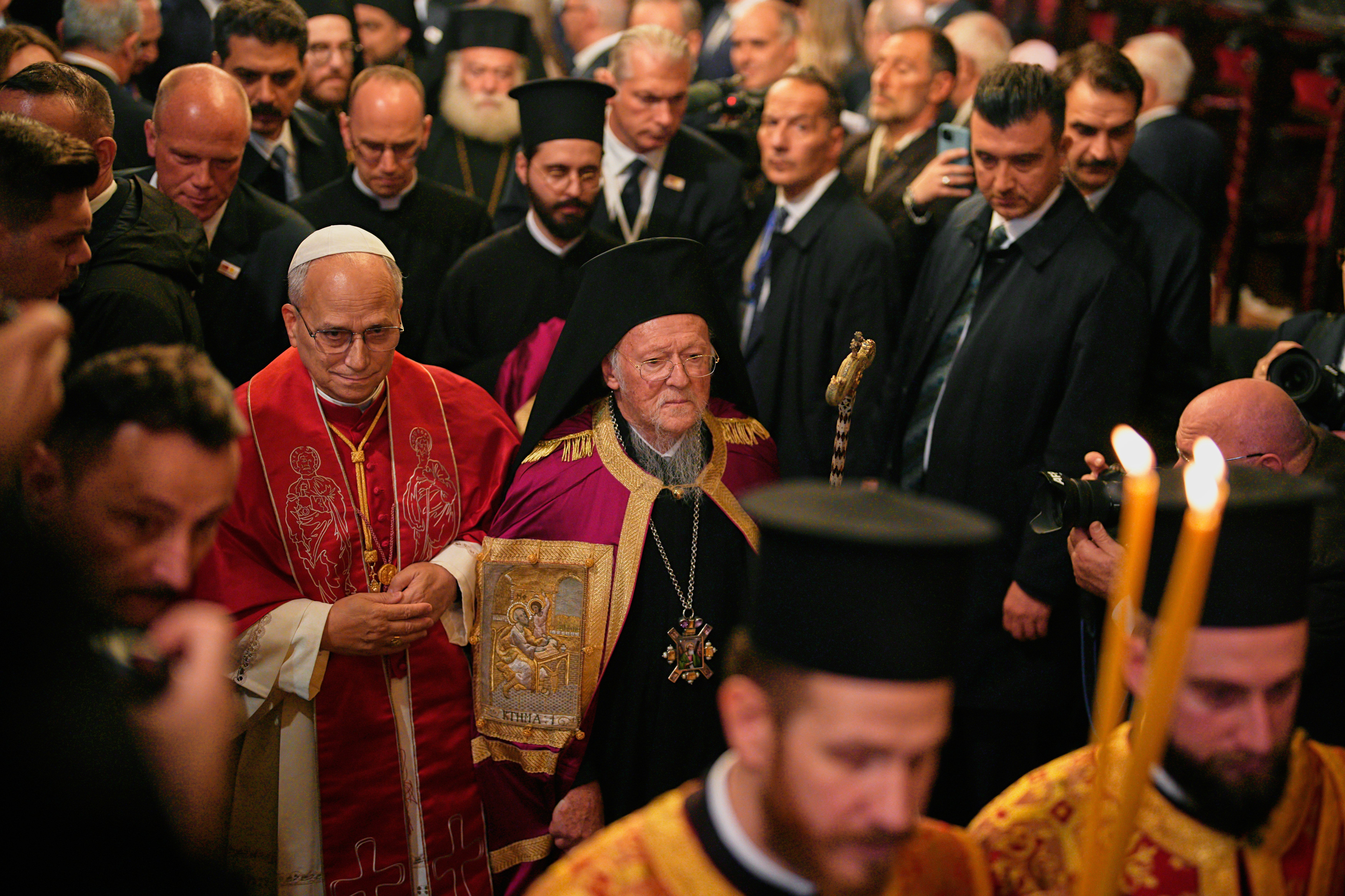 Pope Leo XIV and Ecumenical Patriarch Bartholomew I, the spiritual leader of the world's Eastern Orthodox Christians leave after attending the Doxology at the Patriarchal Church of Saint George, in Istanbu