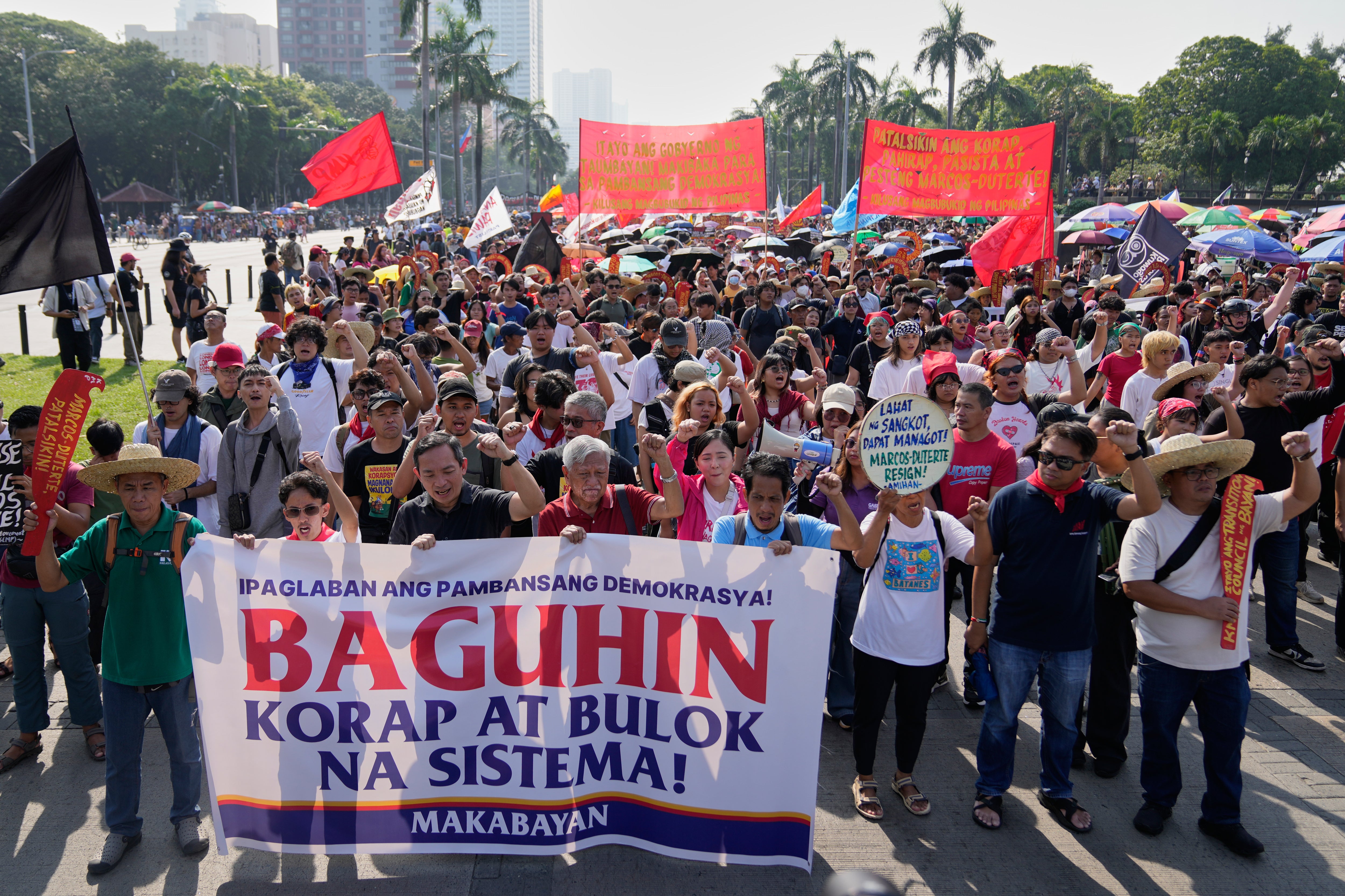 Thousands in Philippines protest corruption and demand return of stolen funds from flood projects | The Independent