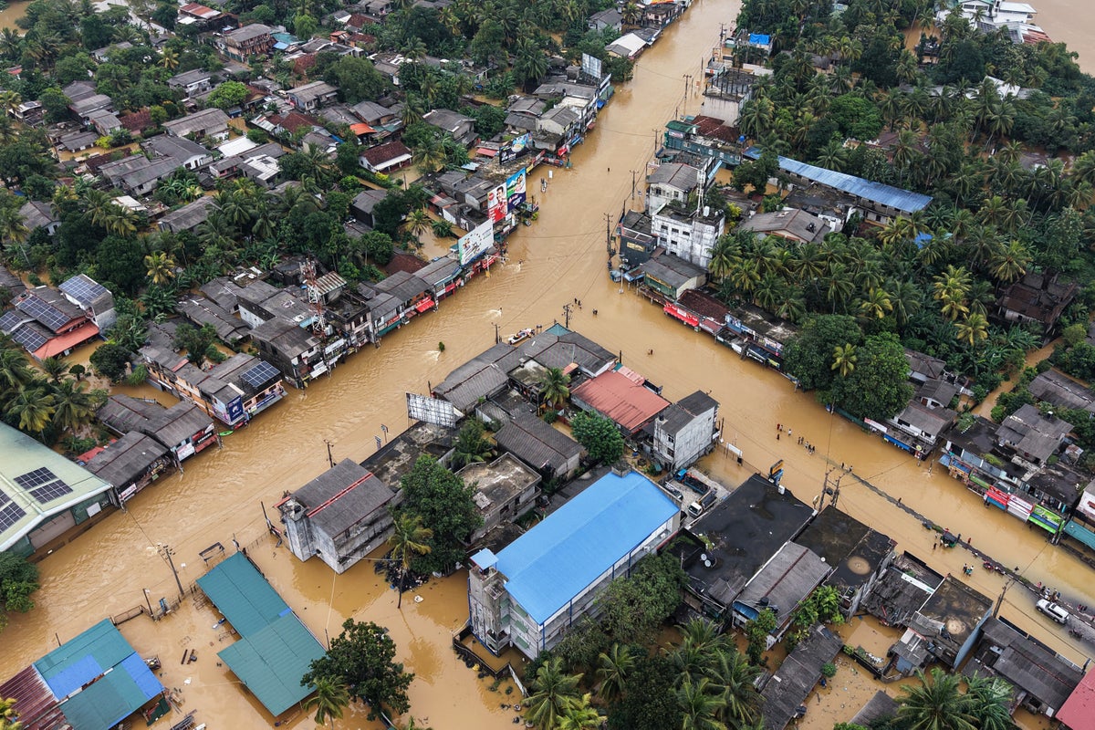 Floods and cyclonic storms across Asia leave over 900 dead and hundreds missing