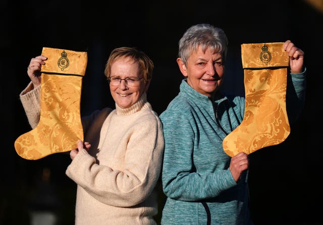 <p>Sandringham curtains have been turned into Christmas stockings</p>