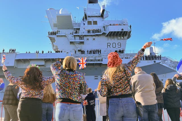 Friends and family wave as HMS Prince of Wales returns to Portsmouth Naval Base (Ben Mitchell/PA)