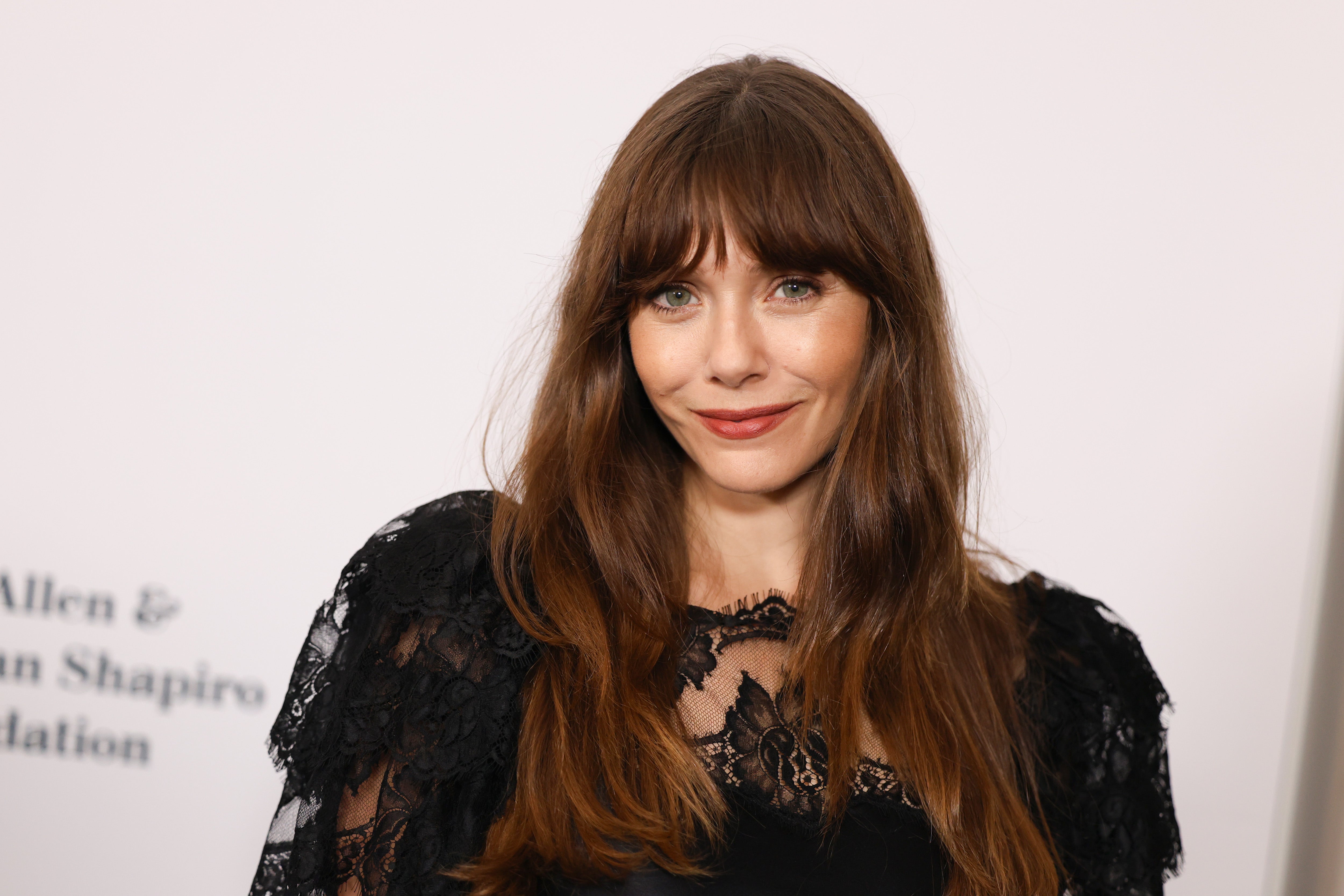 Elizabeth Olsen has shared an inside look at growing up with older sisters Mary-Kate and Ashley Olsen