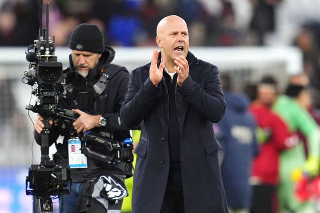 Liverpool head coach Arne Slot applauds fans after the game (Adam Davy/PA)