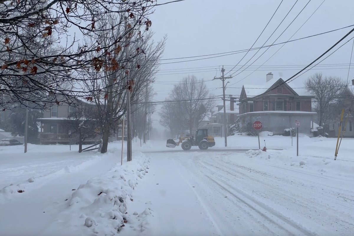 Crews restoring power in Wisconsin while Iowa airport tries to reopen after plane left icy runway