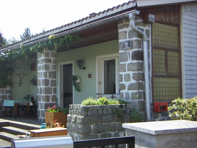 <p>The listing, pictured, highlights the property’s proximity to a kindergarten, school and shops but fails to mention its gruesome wartime past</p>