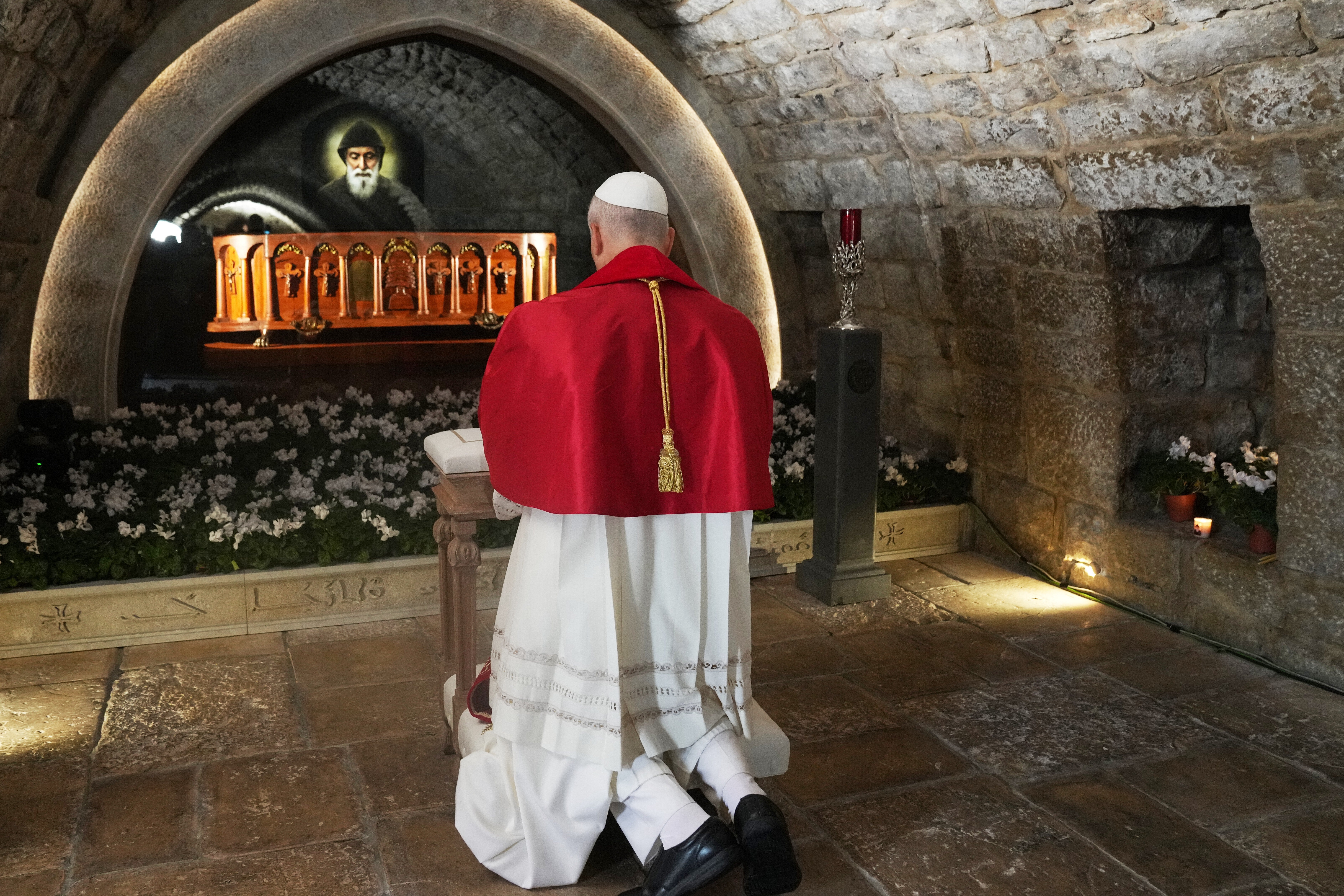 The pope prays at the tomb of St Charbel Makhlouf