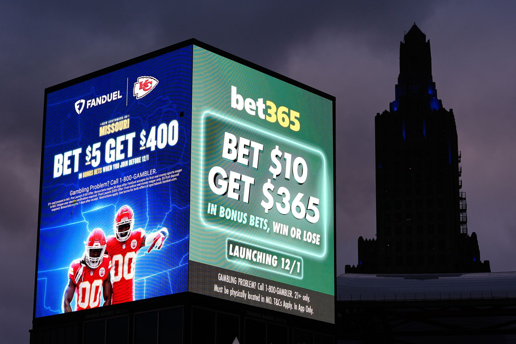 Advertisements for sports betting apps are seen in downtown Kansas City