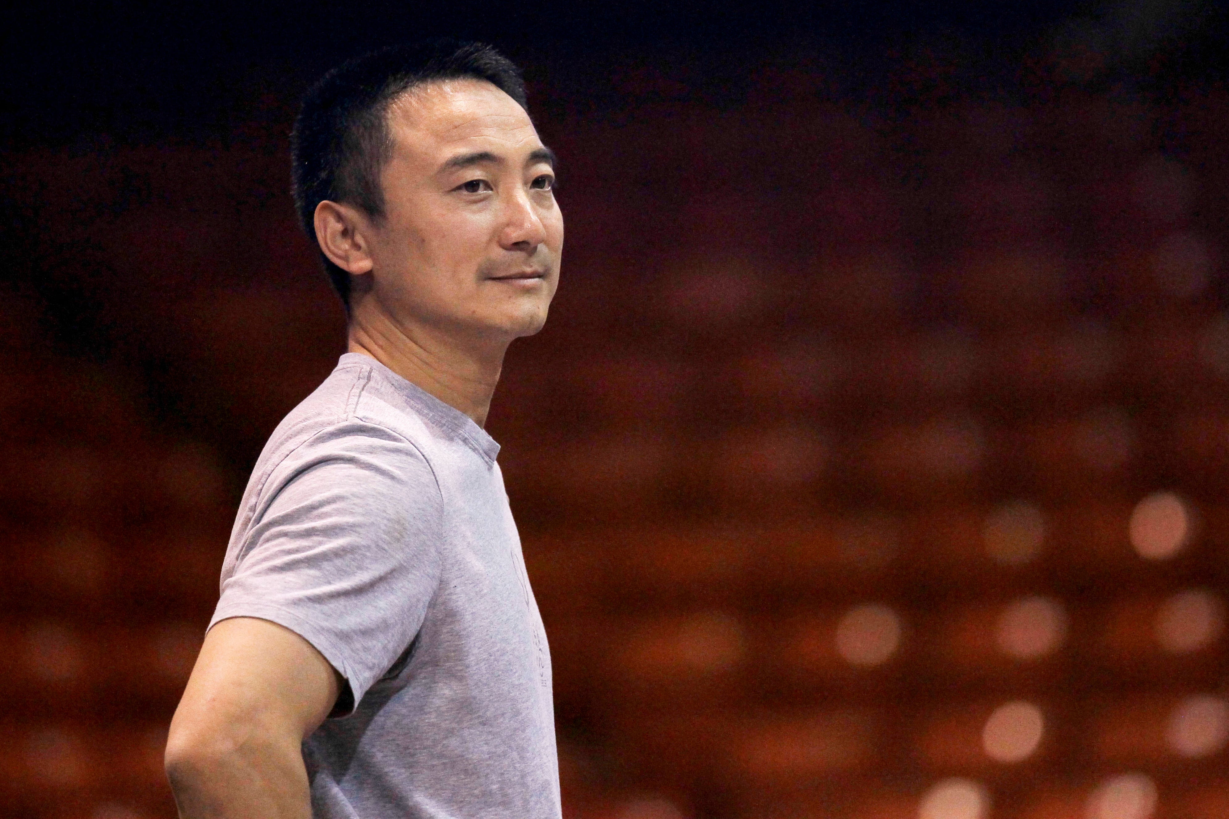 Gymnastics coach Liang "Chow" Qiao is seen during a practice session for the US Classic gymnastics meet, May 25, 2012
