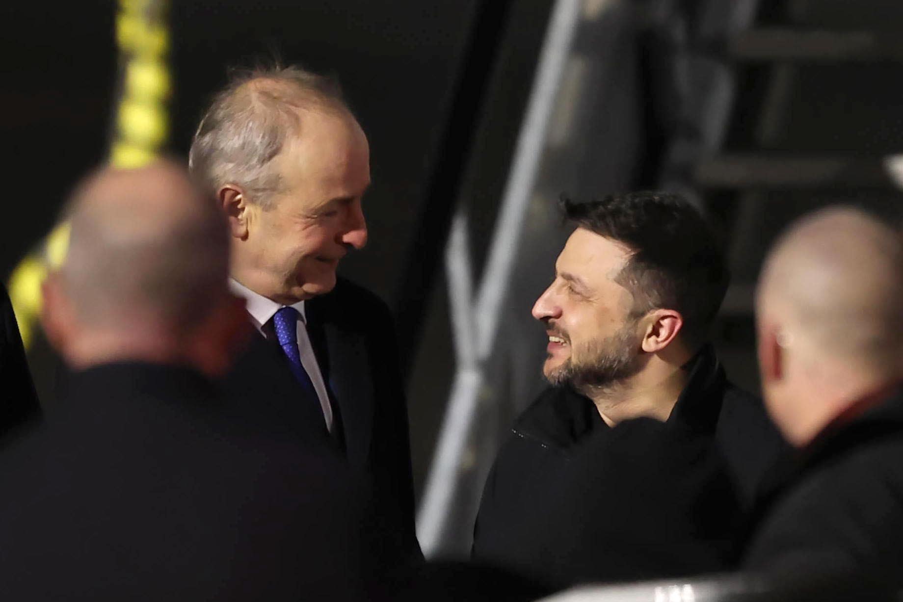 Taoiseach Micheal Martin speaks to Ukrainian President Volodymyr Zelensky as he arrives at Dublin Airport (PA)