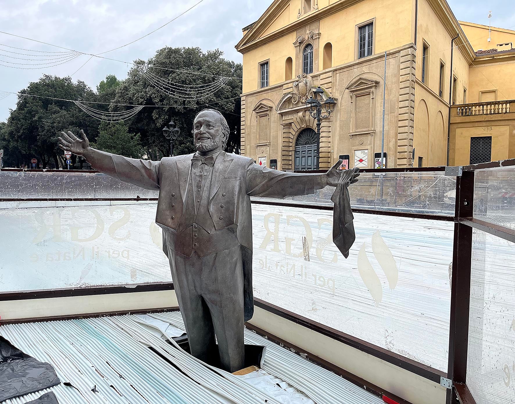 The statue of Pavarotti in the town of Pesaro is now surrounded by an ice rink