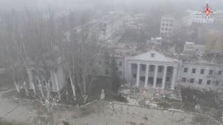 A drone view shows a heavily damaged building in Pokrovsk