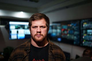 Serhii Filimonov, commander of the Da Vinci Wolves Battalion, stands in an operations room near the front line in eastern Ukraine