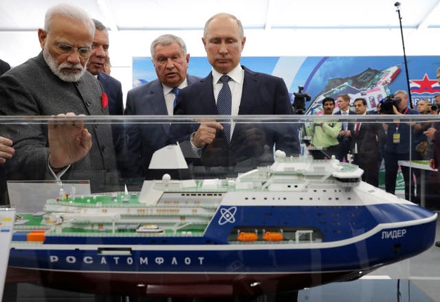 <p>Russian President Vladimir Putin, right, and Indian Prime Minister Narendra Modi, left, look at a model of a Leader nuclear-powered icebreaker as they visit the Zvezda shipyard in the town of Bolshoi Kamen, Russia, on Sept. 4, 2019</p>
