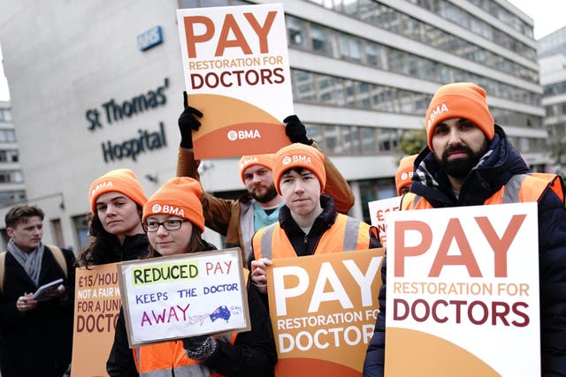 Junior doctors on the picket line outside St Thomas’ Hospital, central London, during their continuing dispute over pay (James Manning/PA)