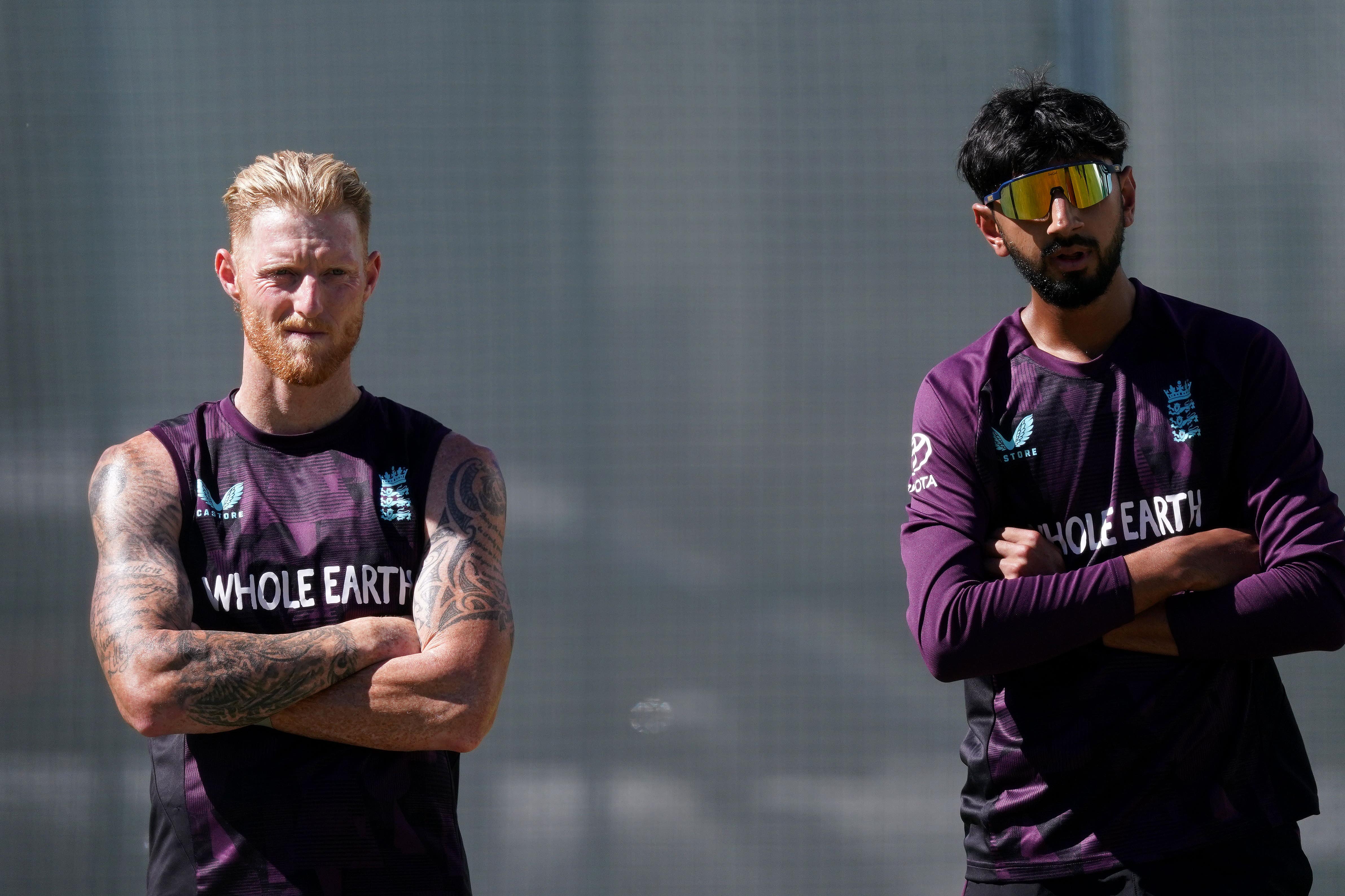 Ben Stokes and Shoaib Bashir stand during an England nets session at The Gabba (Robbie Stephenson/PA)