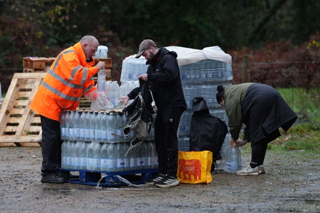 Bottled water is handed out in Tunbridge Wells (Gareth Fuller/PA)