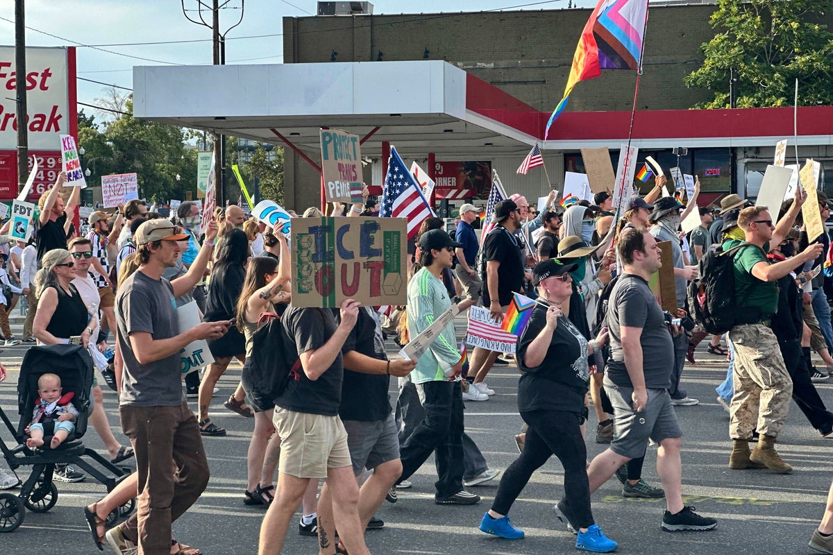 Safety volunteer charged in the fatal shooting of a Utah 'No Kings' protester