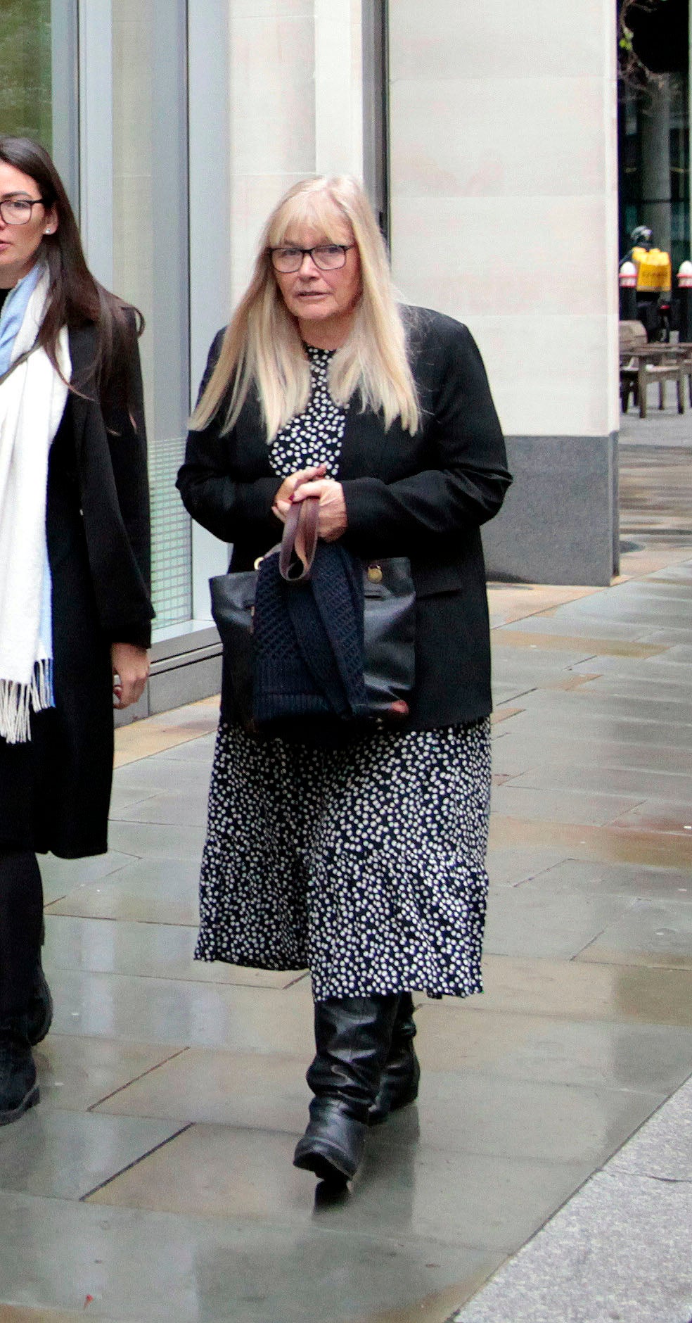 Picture shows Rosemary Talbot outside London's High Court during a will fight