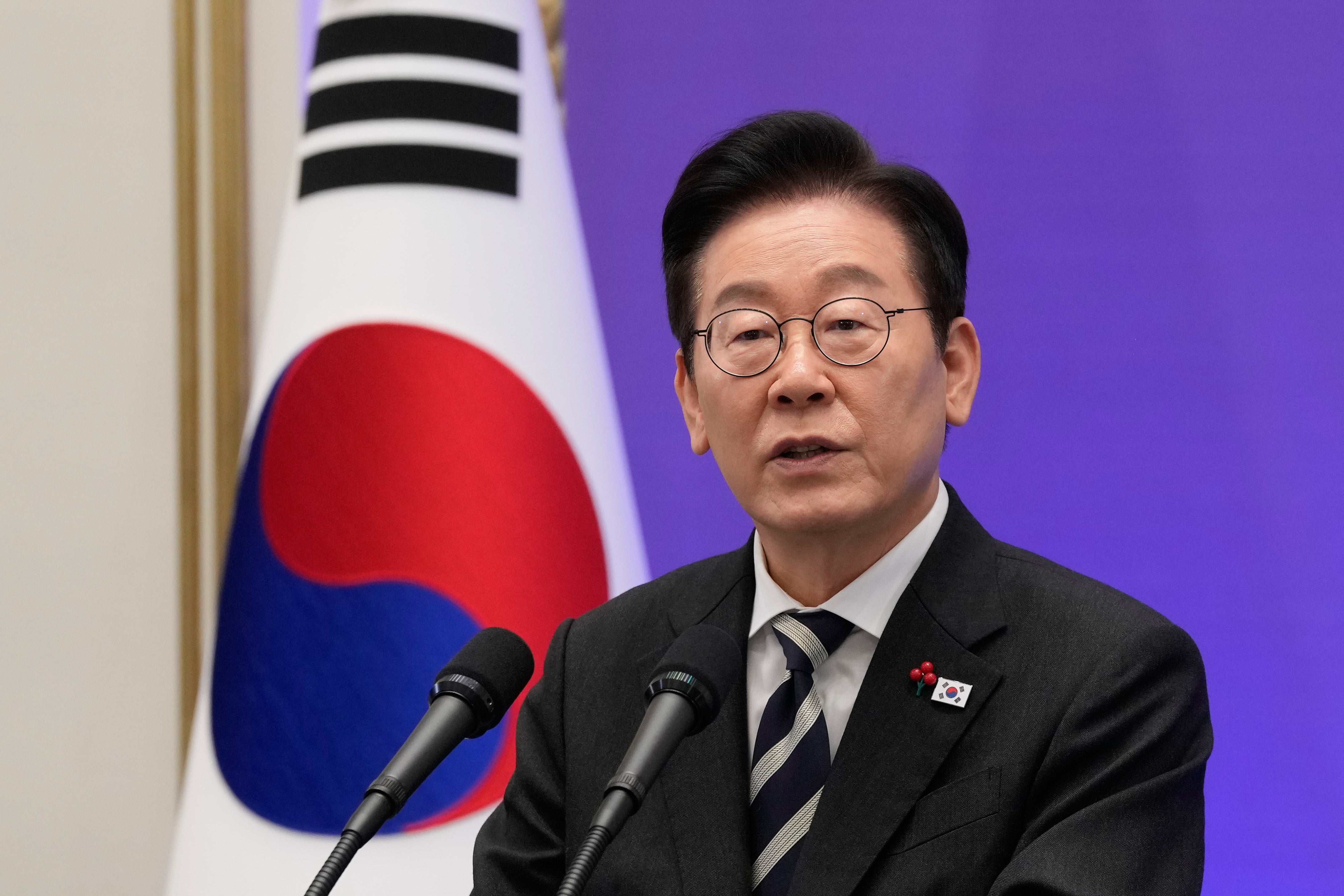 South Korean President Lee Jae Myung speaks during a news conference to mark the first anniversary of the December 2024 martial law crisis
