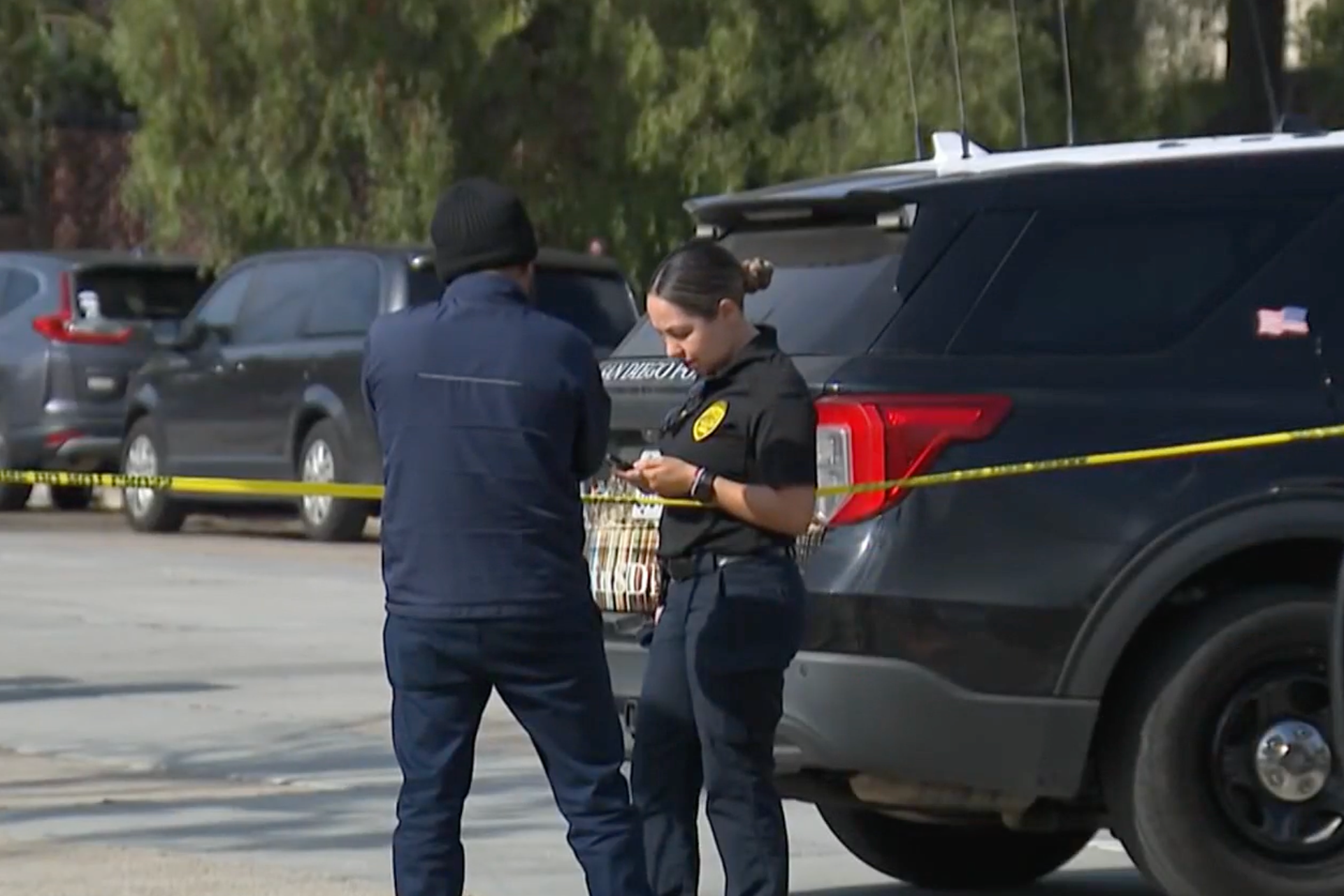 <p>Police outside the property in San Diego, California, where human remains belonging to 'multiple persons' were discovered earlier this week</p>