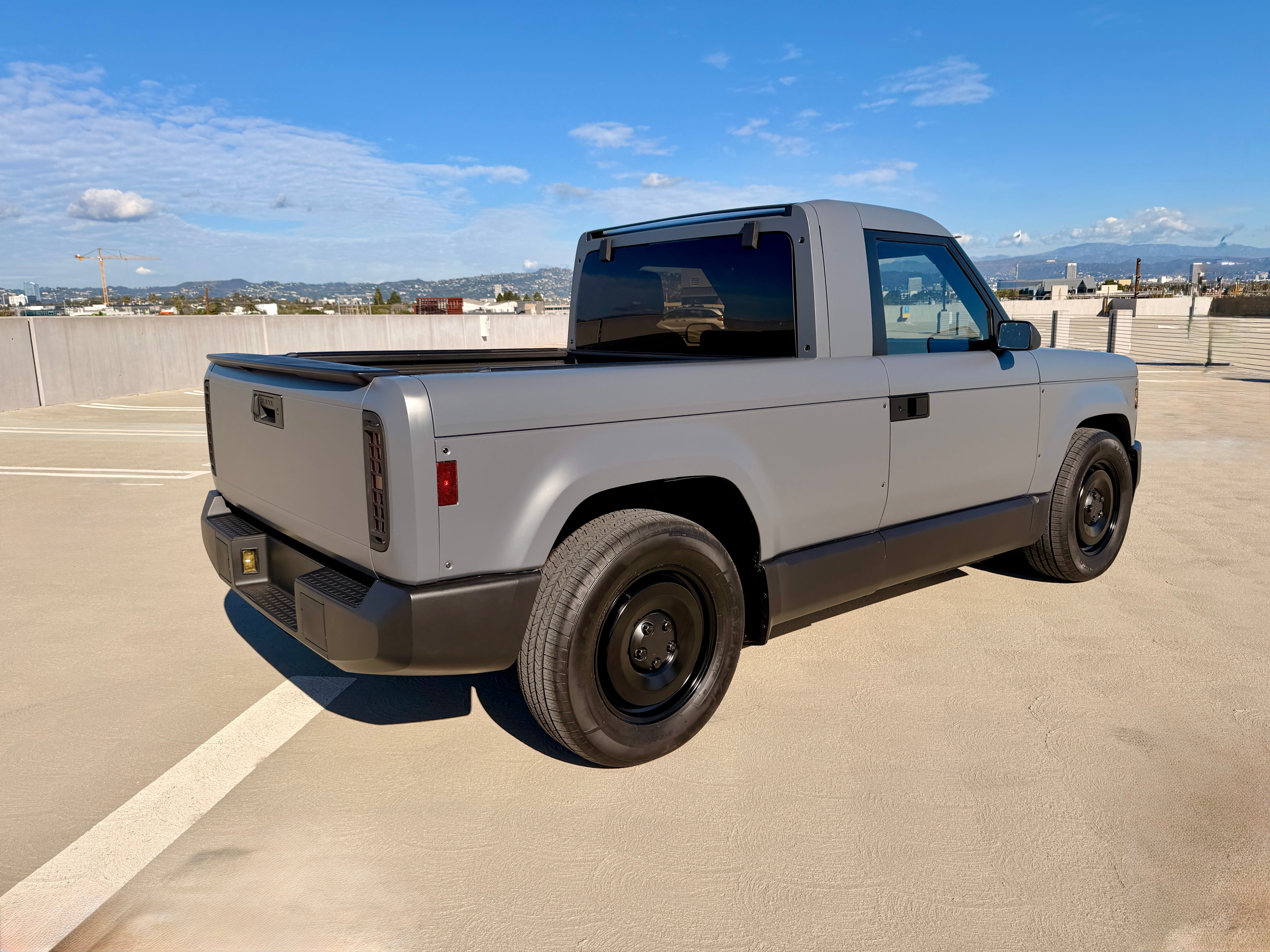 The Slate is a compact all-electric pick-up with hints of cool 1960's US vehicles like the Ford Bronco