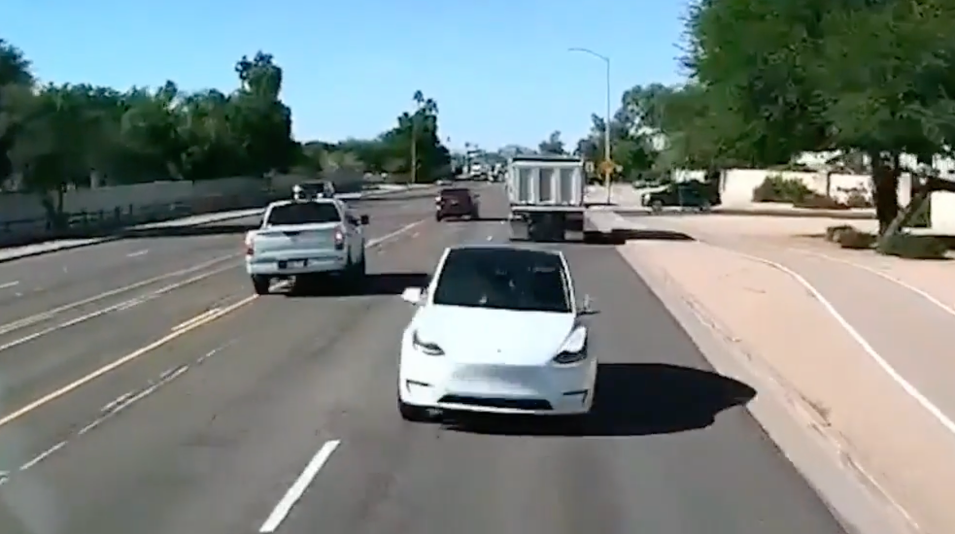 <p>Tesla swerves into oncoming traffic</p>