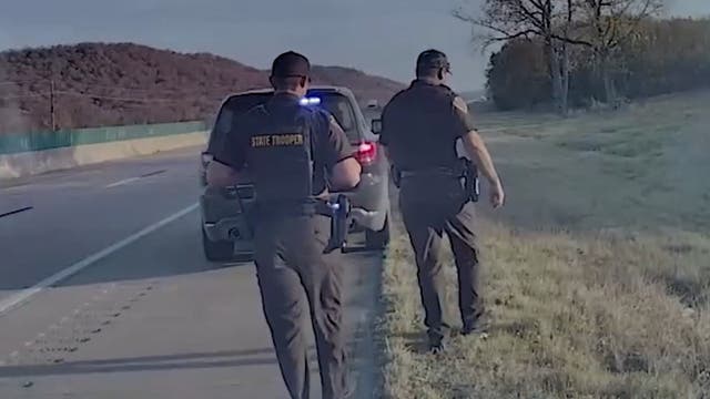 <p>Truck driver facing deportation after unsecured load of tires flies across highway towards police car</p>