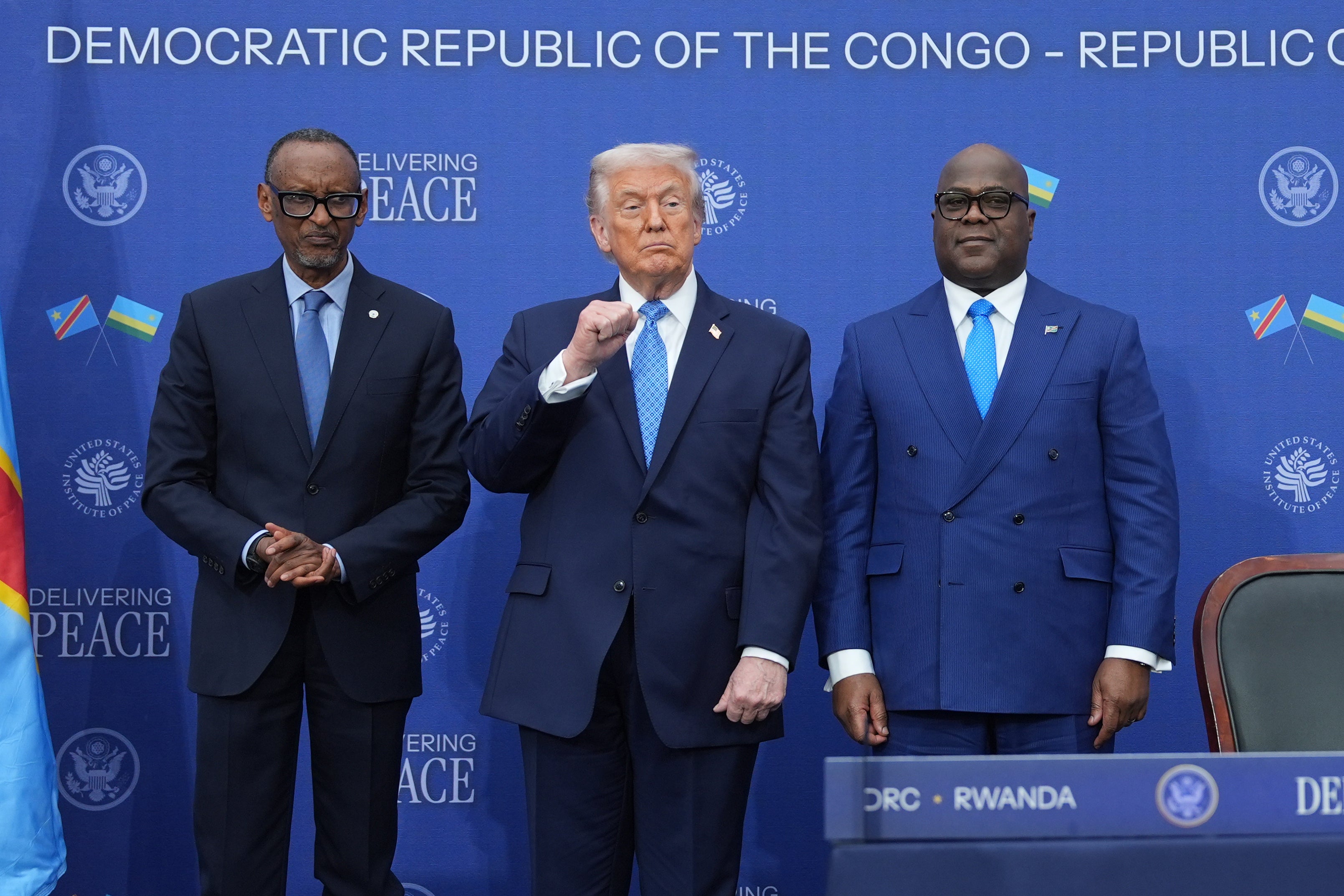 <p>Trump is flanked by Rwanda president Paul Kagame (left) and DR Congo president Felix-Antoine Tshisekedi (right)</p>