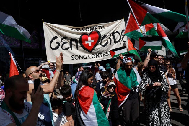 <p>Pro-Palestine protesters march outside the arena in Basel, Switzerland, at Eurovision 2025</p>