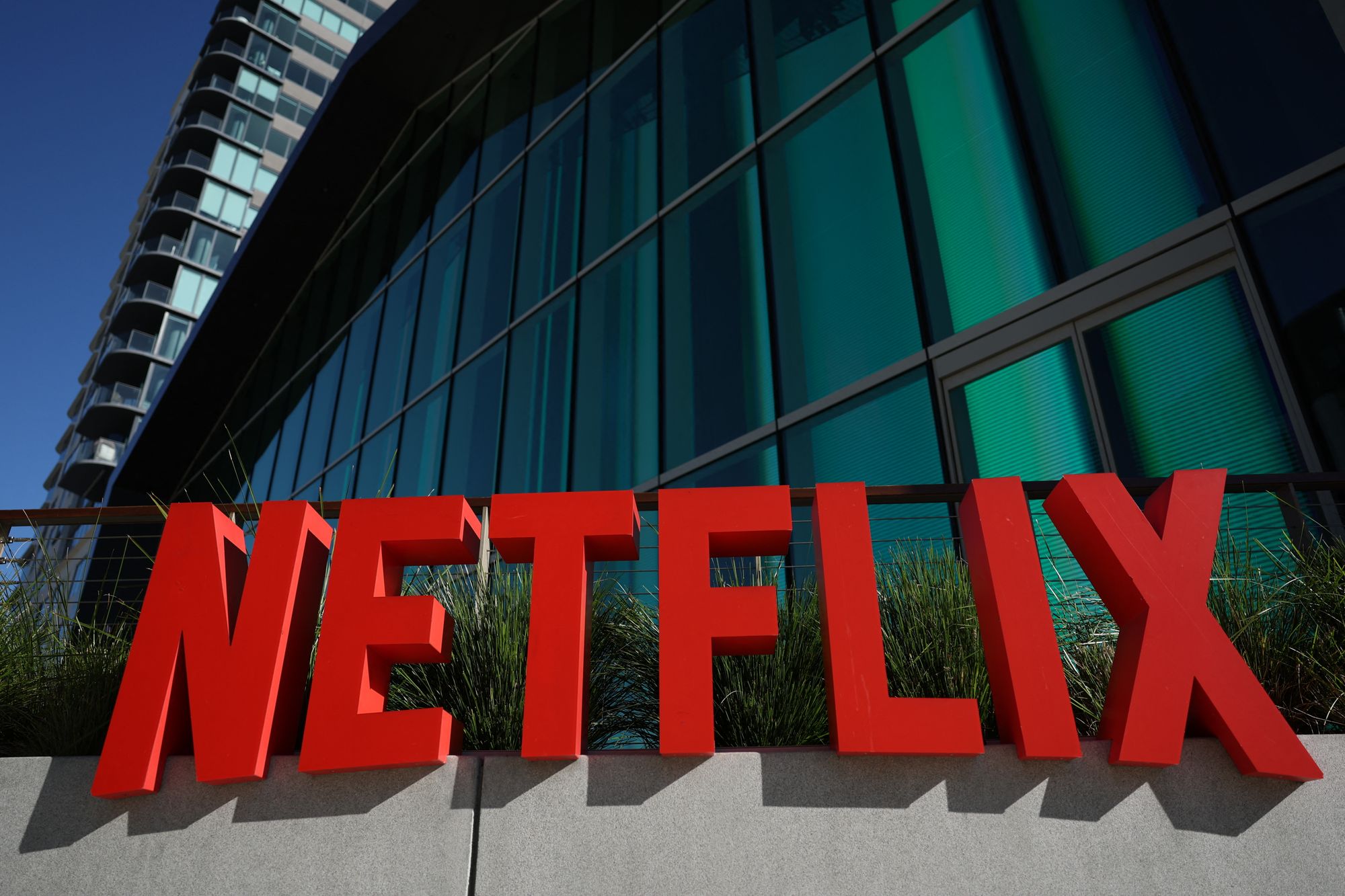 The Netflix logo is pictured at the company's offices on Vine in Los Angeles, California on December 5, 2025