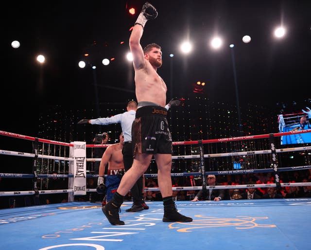 <p>Johnny Fisher celebrates after scoring three quickfire knockdowns of Ivan Balaz</p>