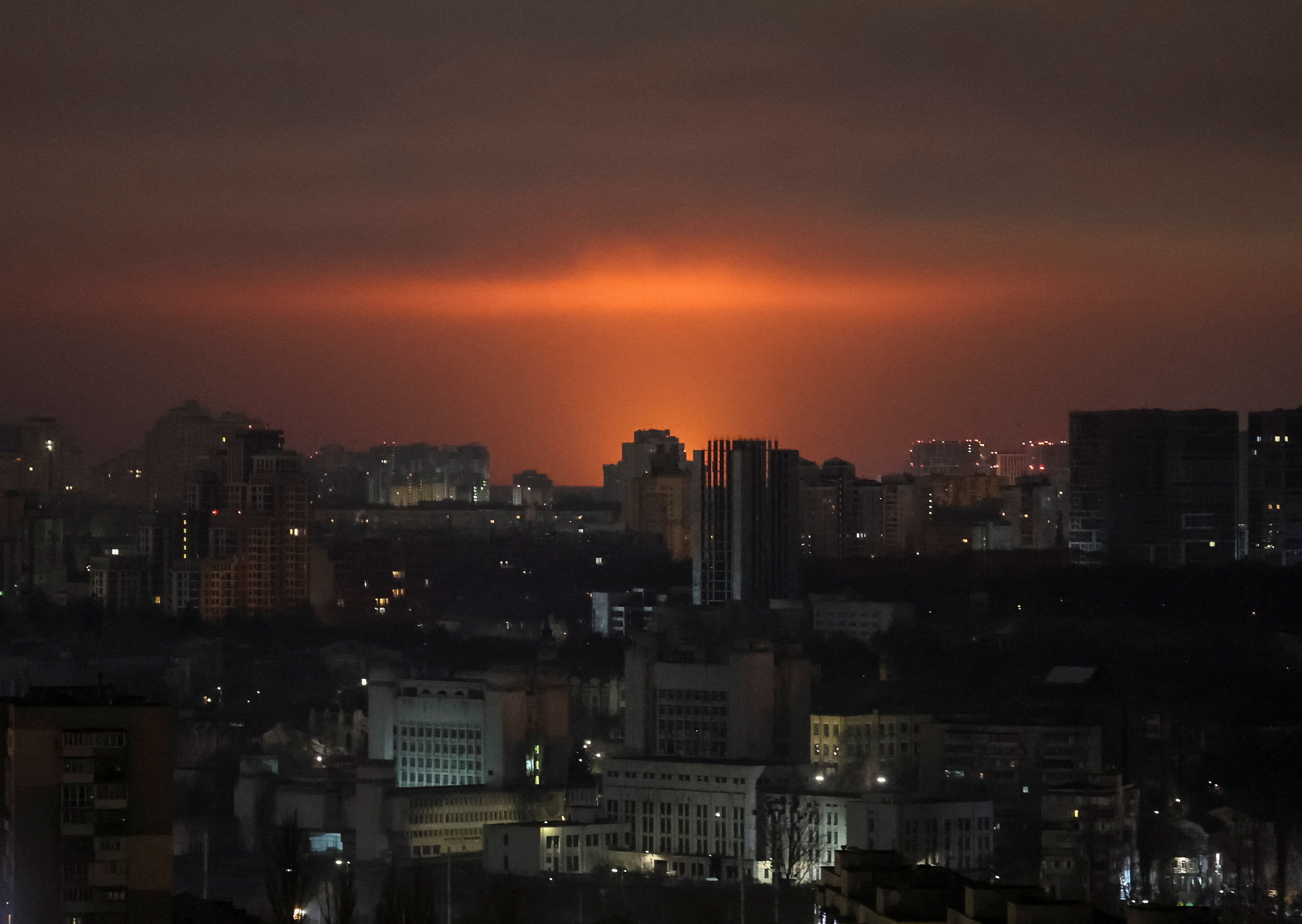 An explosion of a drone lights up the sky over the city during a Russian missile and drone strike, amid Russia's attack on Ukraine, in Kyiv, Ukraine December 6, 2025