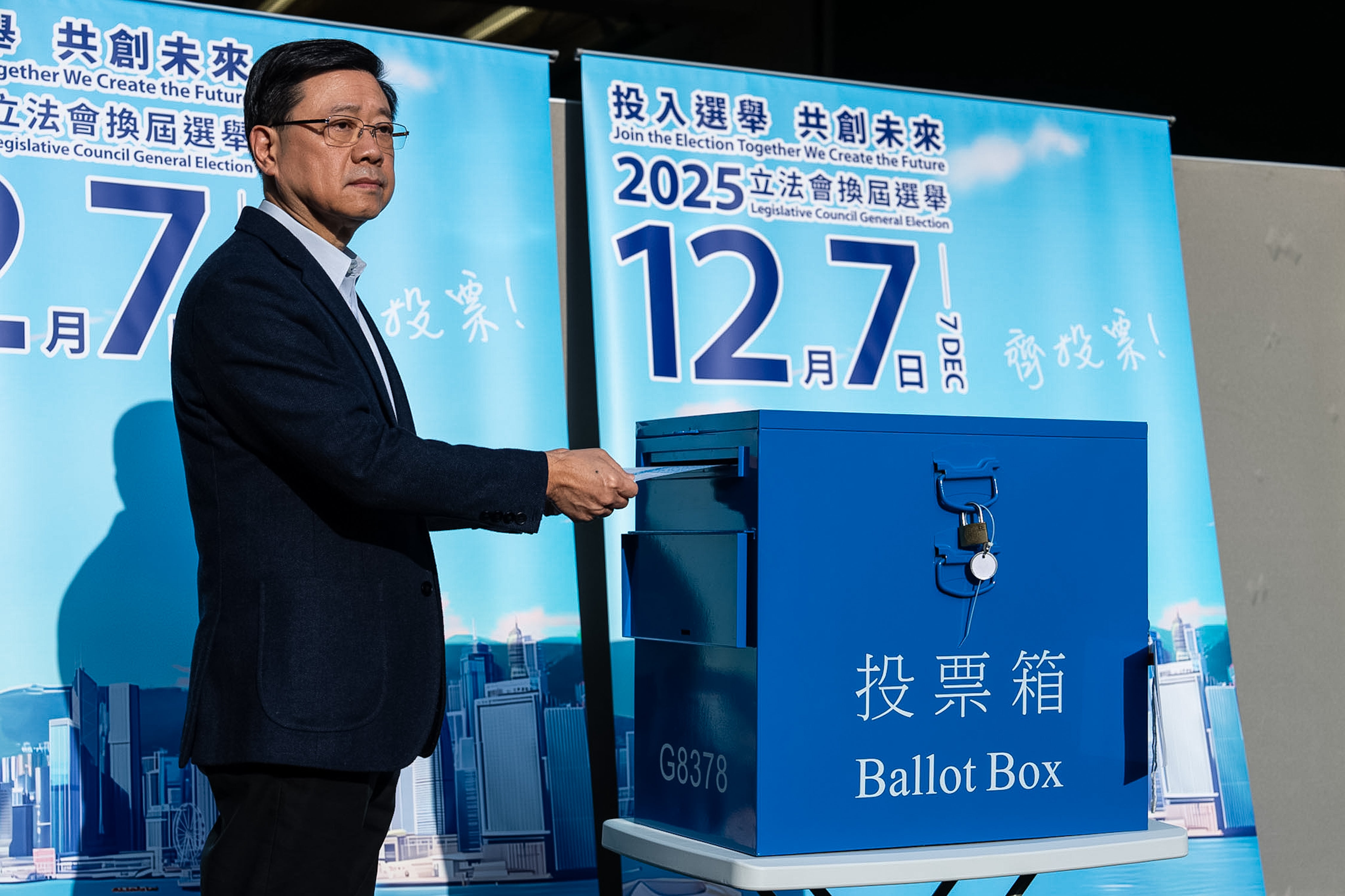 <p>Hong Kong’s Chief Executive, John Lee casts his ballot at a polling station during the Legislative Council General Election in Hong Kong on Sunday, 7 December 2025</p>