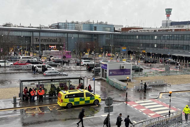 <p>An emergency vehicle outside Heathrow Terminal 3 (Andrew Matthews/PA)</p>
