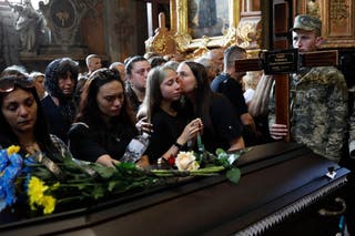 Mourners say goodbye to Ukrainian soldiers killed in battle