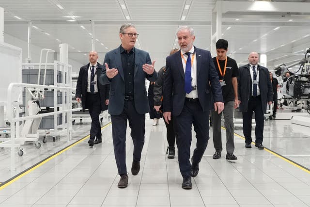 Prime Minister Sir Keir Starmer talking to Michael Straughan at McLaren Automotive (Jonathan Brady/PA)
