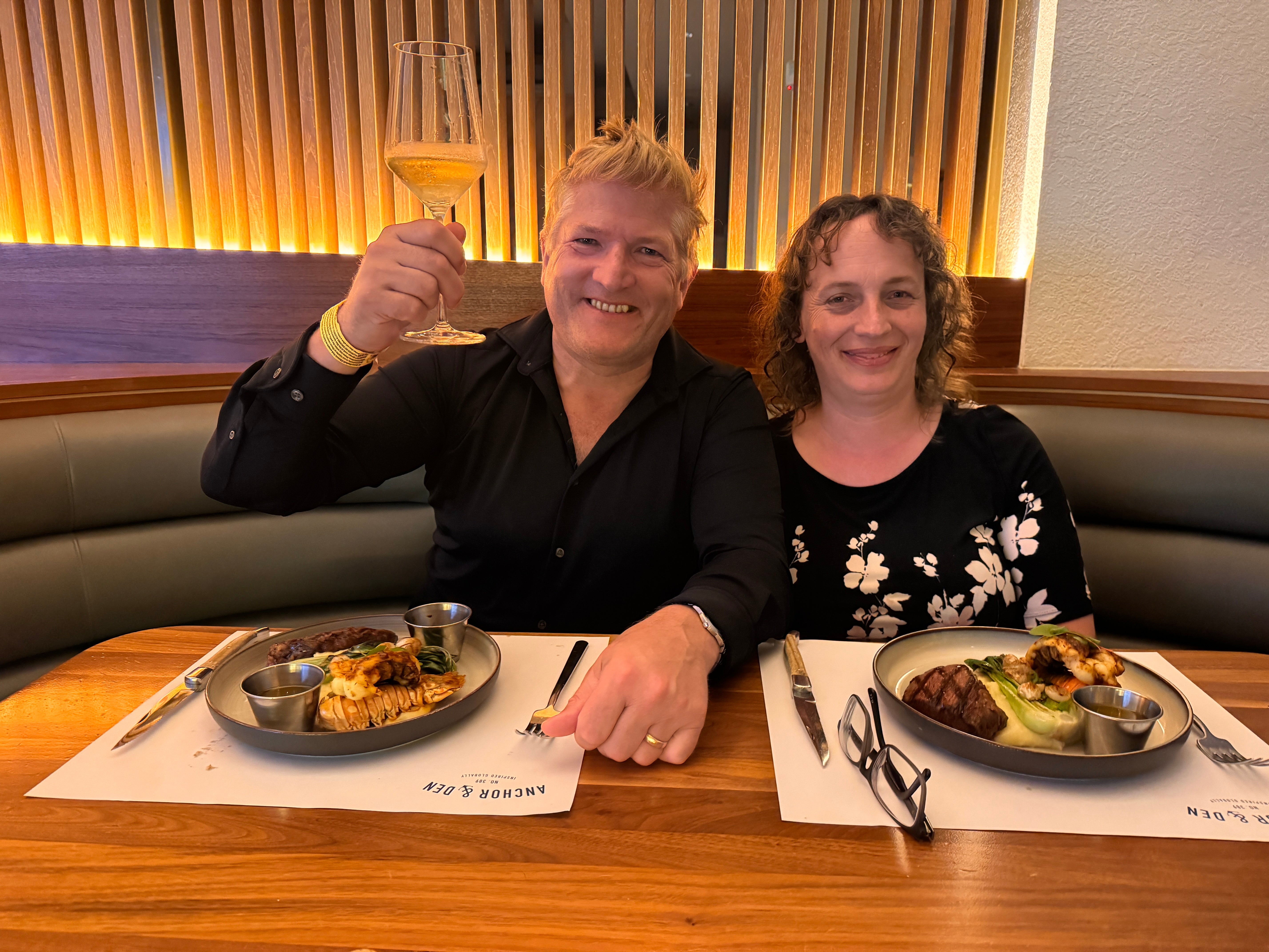 Robin and his wife dining at the Grand Cayman Marriott Resort's Anchor & Den restaurant. The writer discovers that the island deserves its ‘culinary capital of the Caribbean’ boast