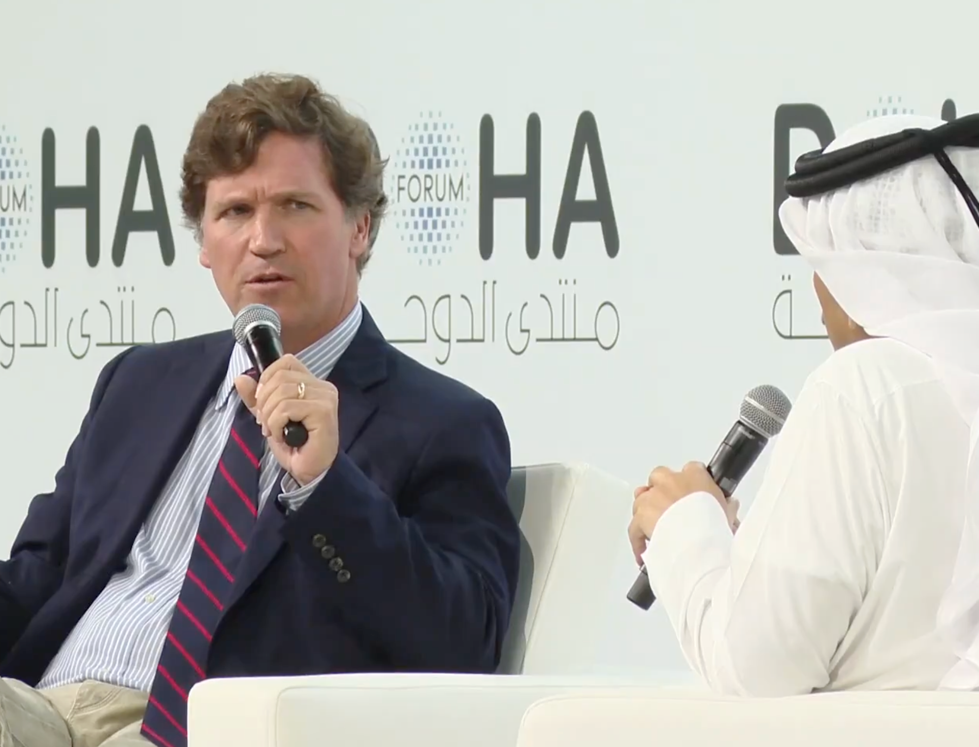 Tucker Carlson interviews Qatari Prime Minister Mohammed bin Abdulrahman bin Jassim Al Thani in Doha, Qatar, on Sunday