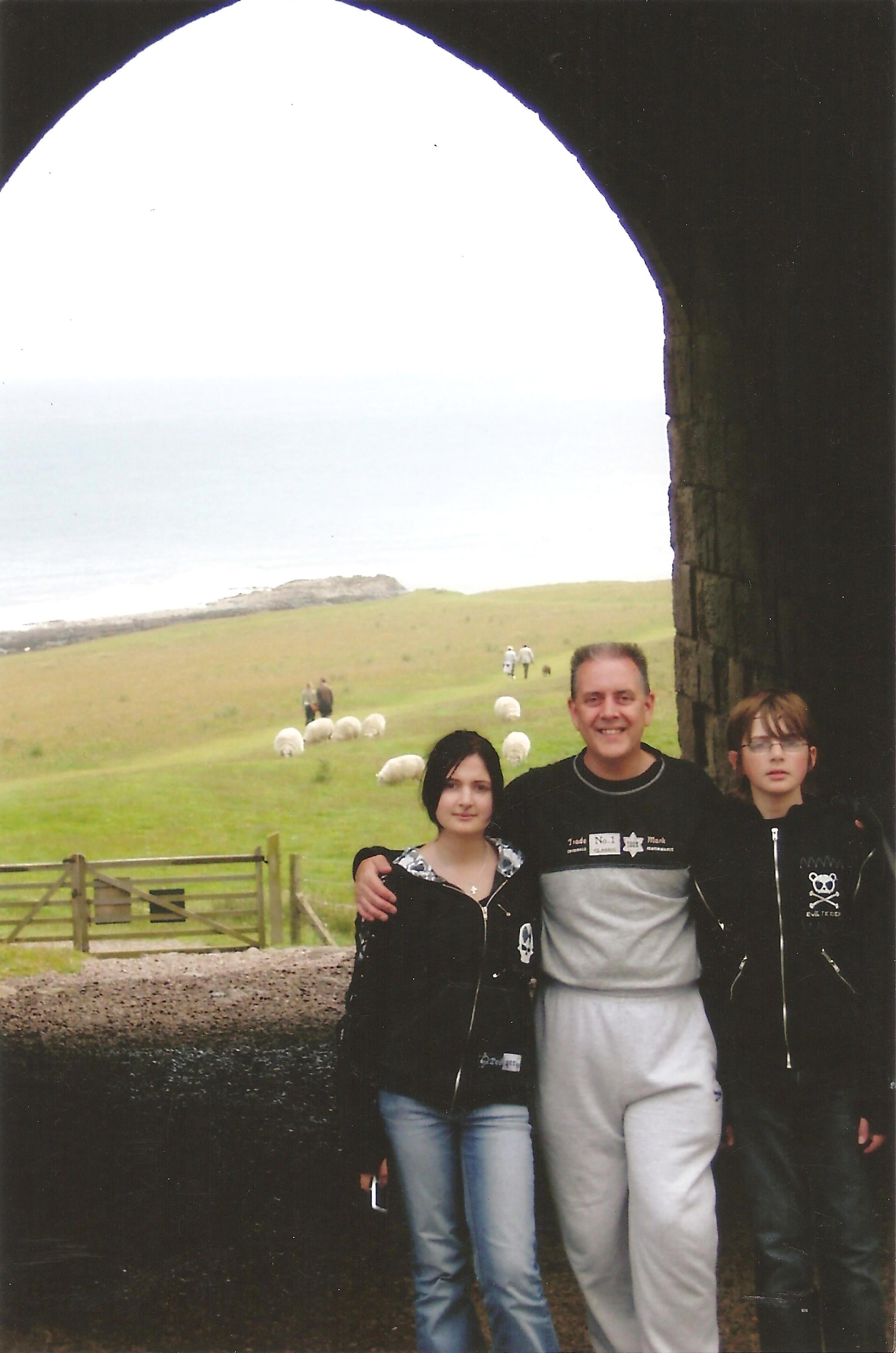 Kevin Godsen with his daughter Charlotte (left) and now missing son Andrew (right)