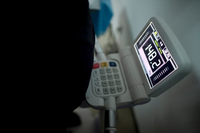 <p>File. Scale shows weight of a child during at a hospital in Beijing</p>