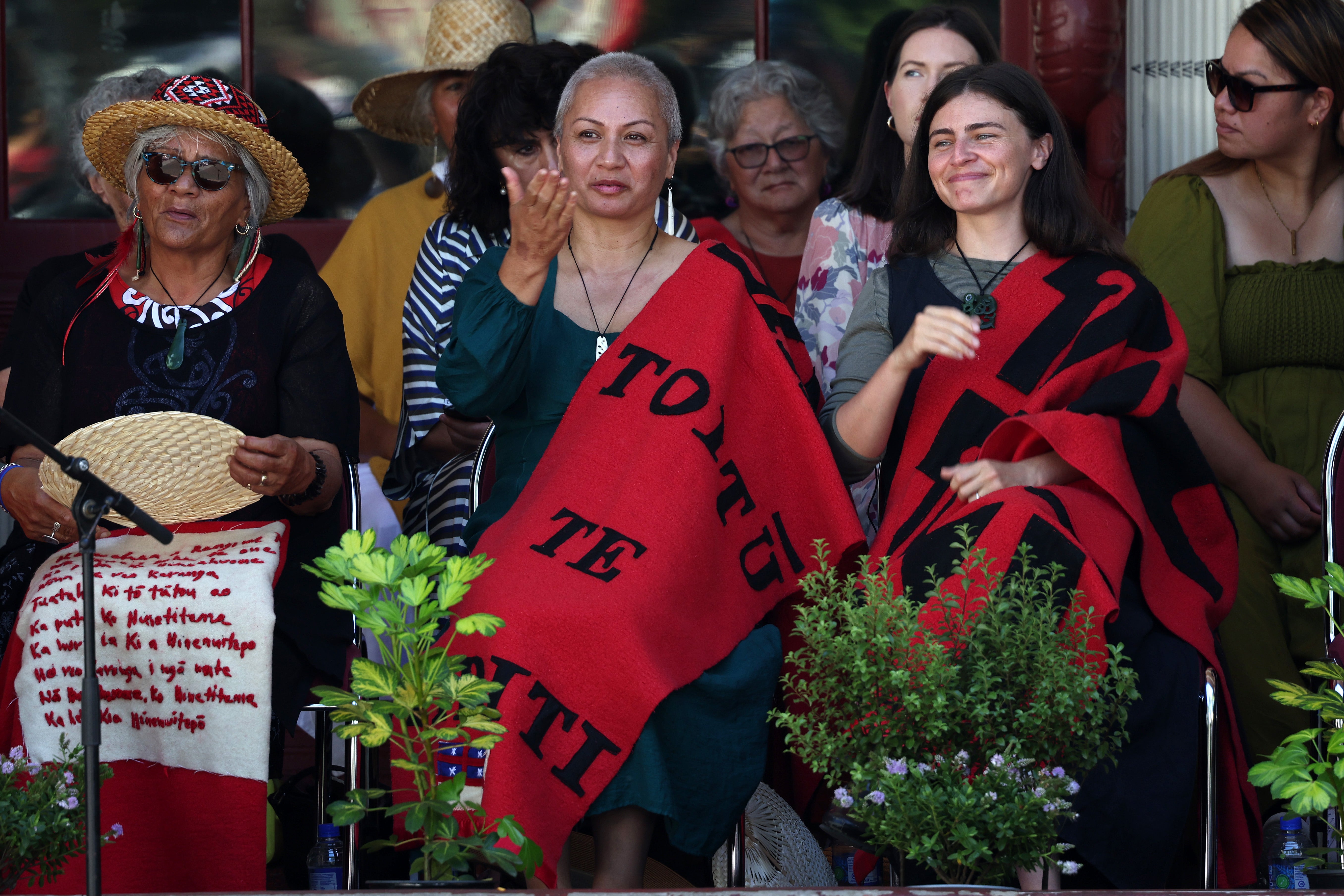 File. Green party leaders Marama Davidson (C) and Chloe Swarbrick (R) during the parliamentary powhiri on 5 February 2025 in Waitangi, New Zealand. Waitangi Day, celebrated on 6 February 2025, marks the 185th anniversary of the signing of Te Tiriti o Waitangi, New Zealand’s founding document, and continues to be a pivotal moment for national reflection and celebration