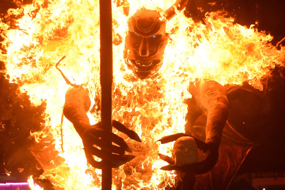 Decapitated Trump effigy burned at annual Christmas festival