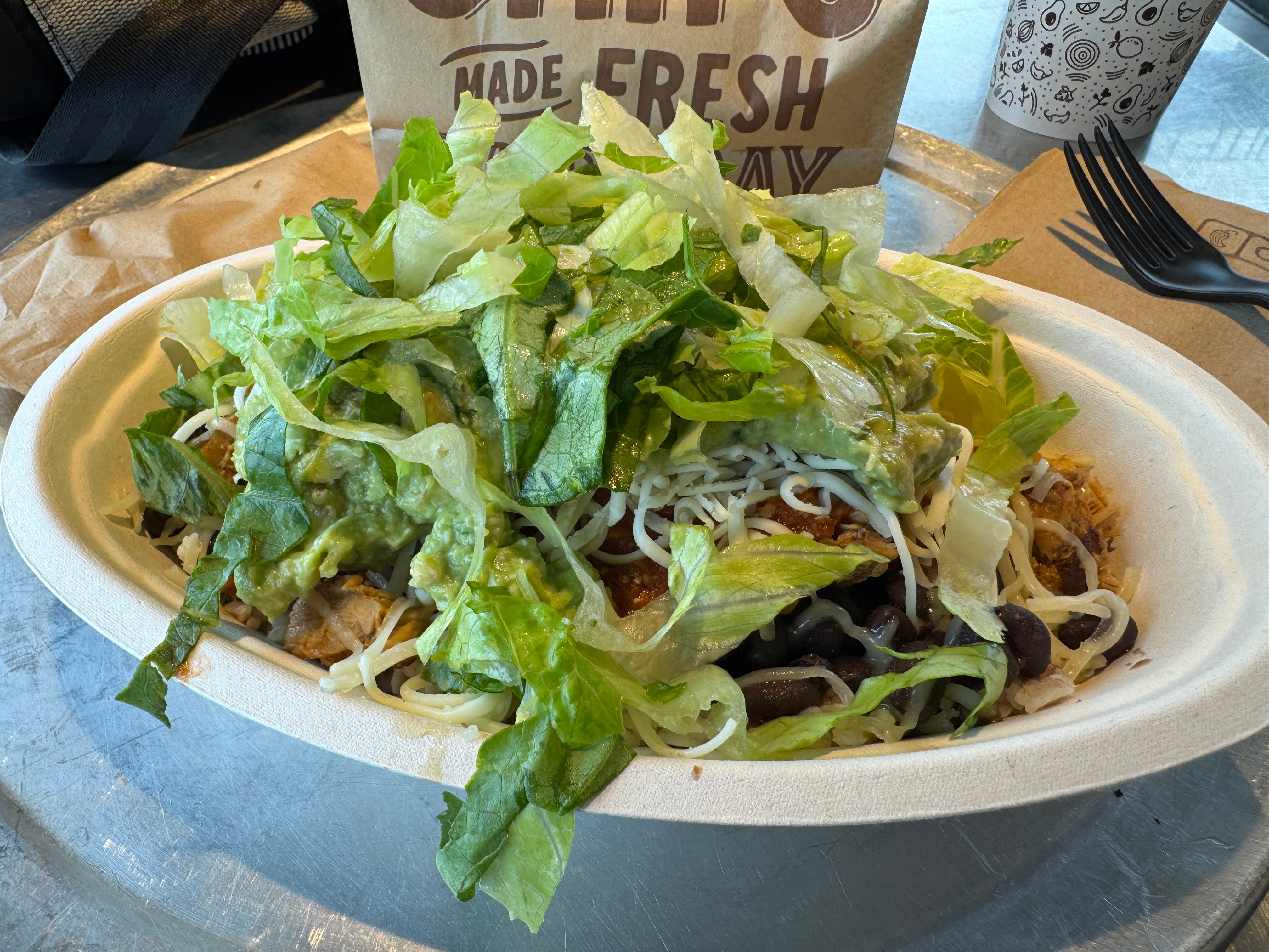 A Chipotle burrito bowl, like the one seen here, was hiding a rodent within, according to Manhattan resident Gia Bernhardt. She is now suing the chain after claiming to have bitten into the animal carcass, causing her unspecified 'severe bodily injuries.'