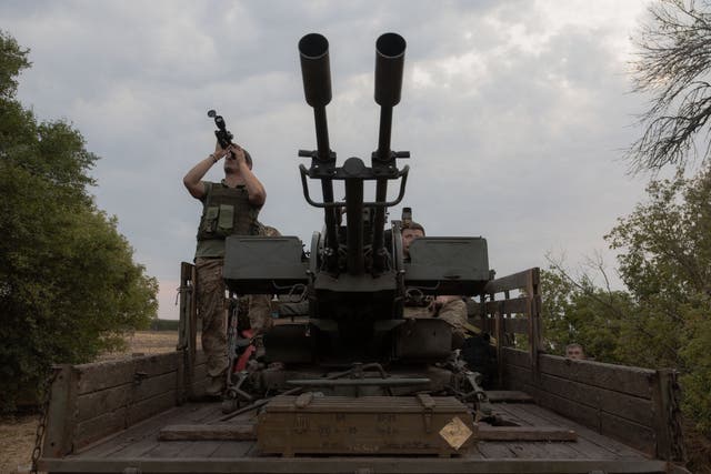 <p>File photo: A Ukrainian serviceman monitors the sky from a military truck </p>